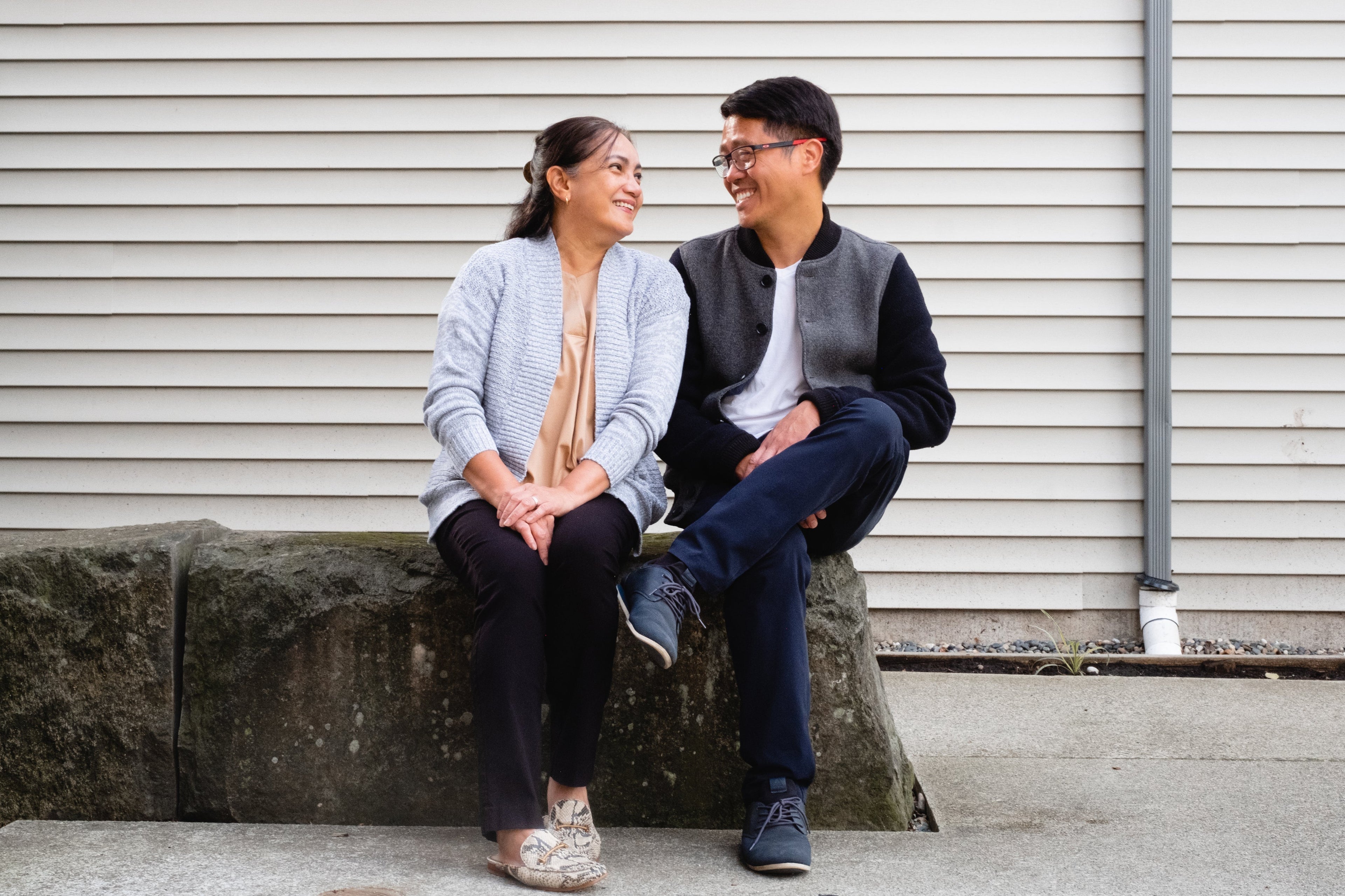An elderly parent with her adult child, both smiling. Adult incontinence and family caregivers might not know all the different types of incontinence products out there. This blog post explains
